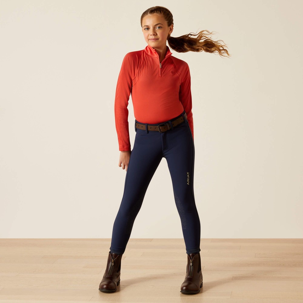 POLO NIÑO/A SUNSTOPPER 3.0 ZIP BAKED APPLE ARIAT